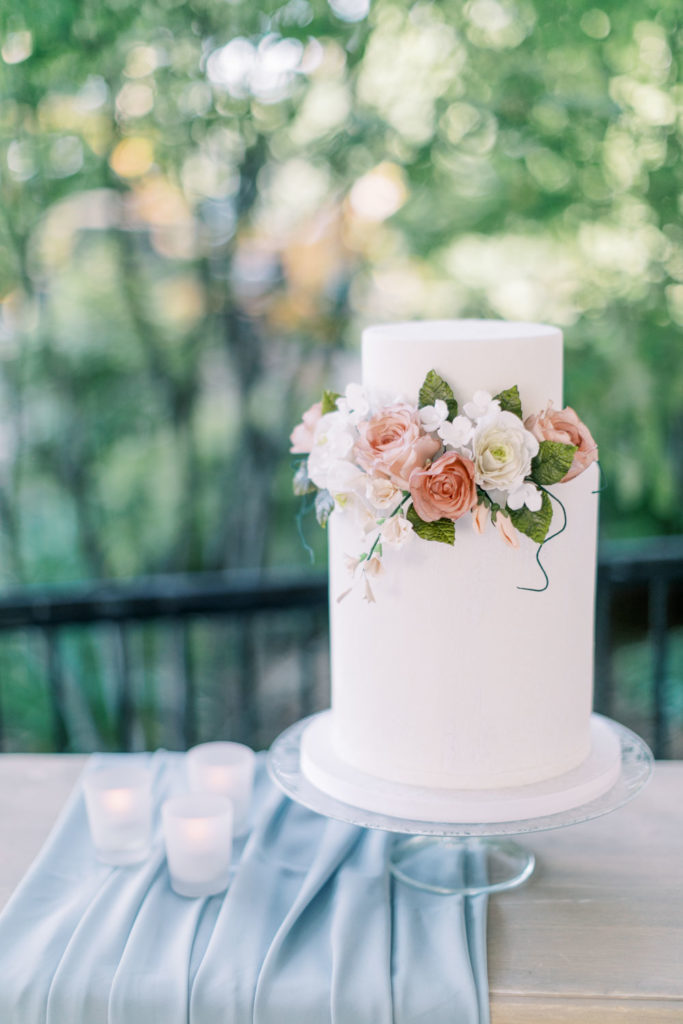 white wedding cake with romantic sugar flowers