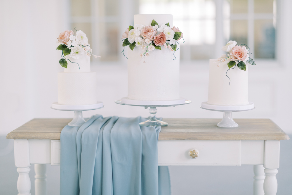 white wedding cakes with romantic sugar flowers